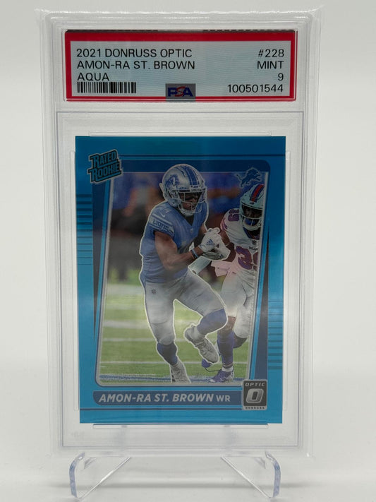2021 Panini Donruss Optic Amon-Ra St. Brown Rated Rookie Aqua 196/299 PSA 9